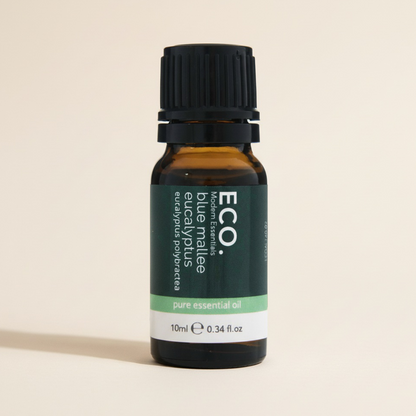Bottle of ECO essential oil on a beige background