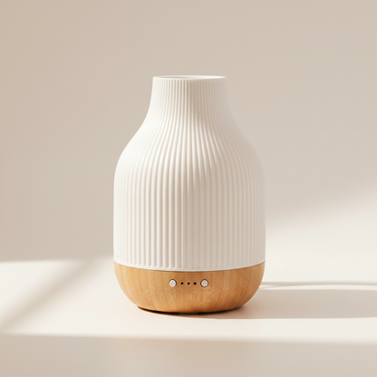 White and wooden diffuser on a light background