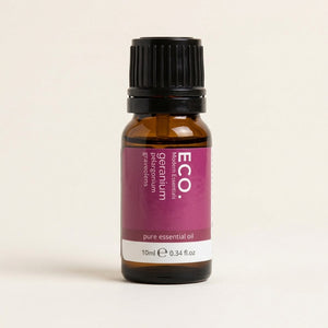 Bottle of ECO essential oil on a beige background