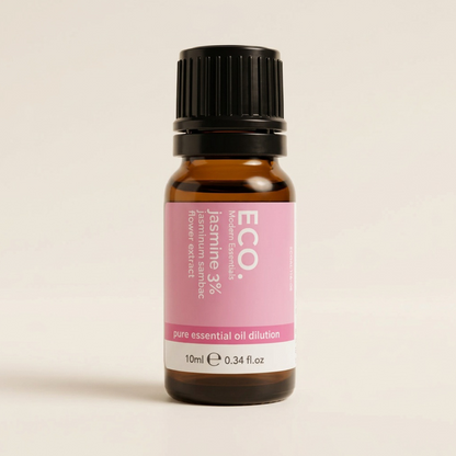 Bottle of ECO Jasmine 3% essential oil on a beige background