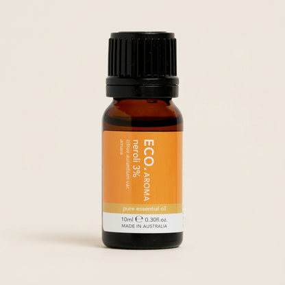 Bottle of ECO Aroma neroli essential oil on a beige background