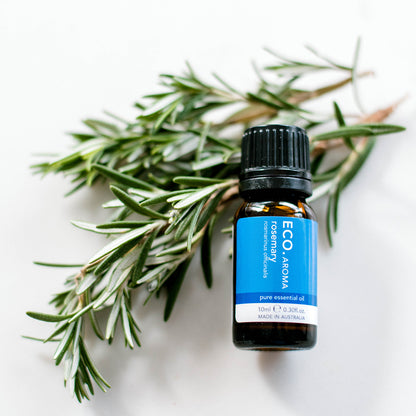 rosemary aromatherapy oil and rosemary sprigs 